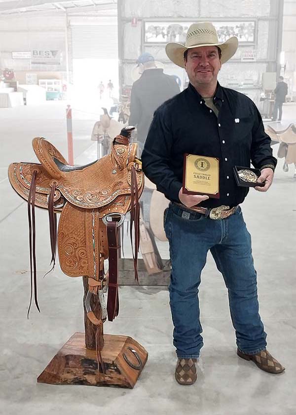 Rob Moreton with winning saddle from Fully Tooled section