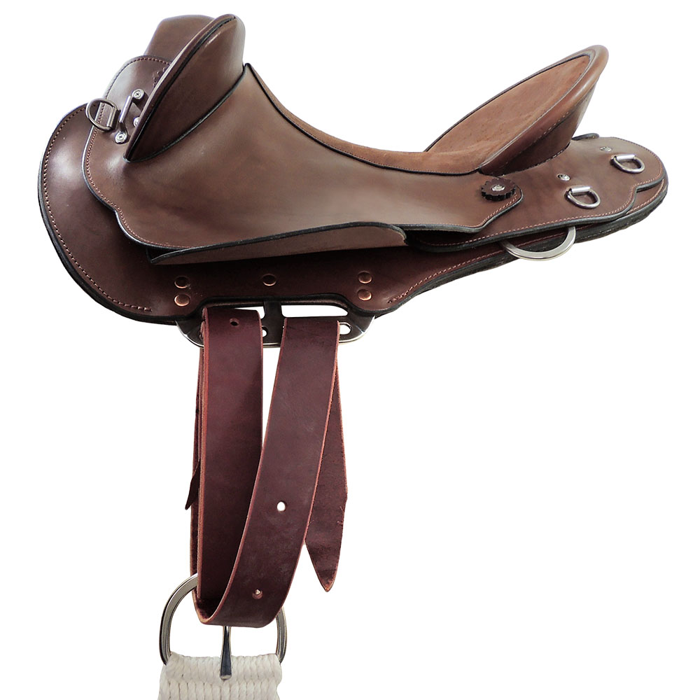 Near side simple saddle rigging example in forward position with 3 way rigplates, leather latigo strap and buckle cinch