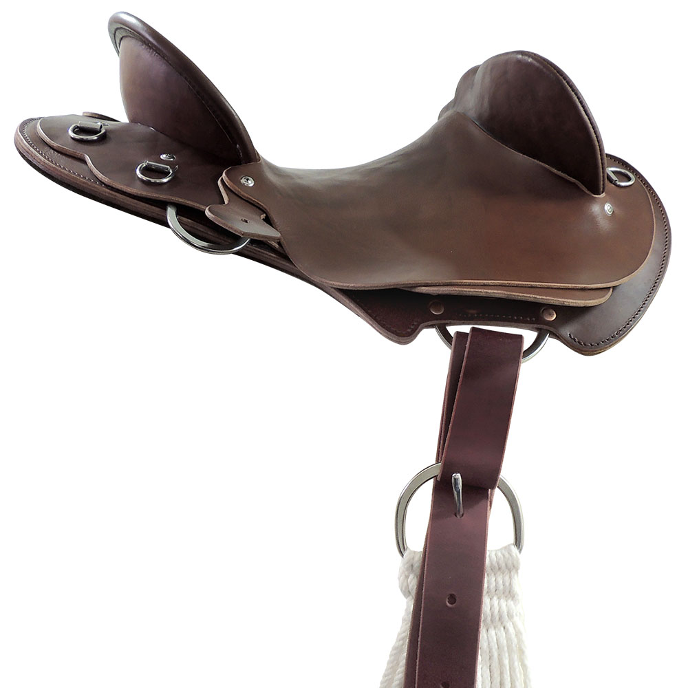 Off side saddle rigging example: C type rigplates with leather halfbreed strap and buckle cinch