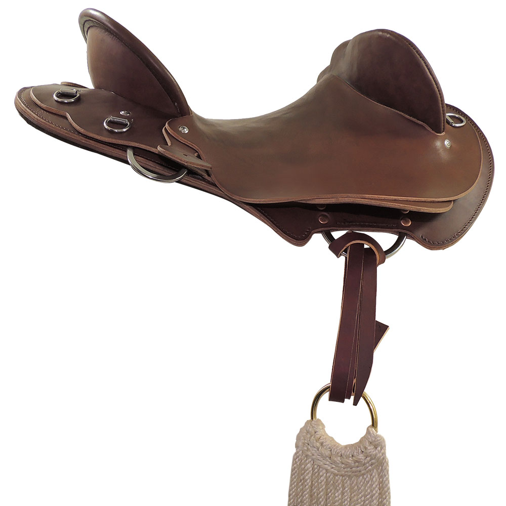 Off side Tackaberry/Bates saddle rigging example, with C type rigplates and latigo leather lace tied to ring cinch