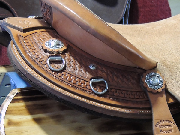 Close up of tooling on Montana Saddlery's saddle