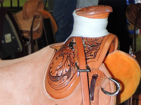 Closeup of leather carving on Trevor Able Western saddle