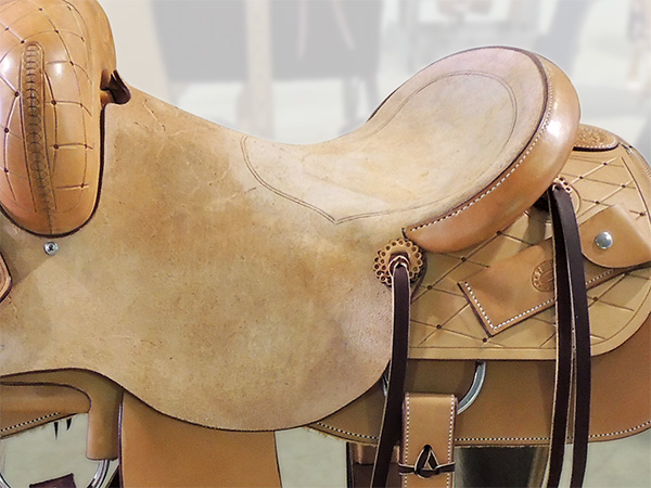 Closeup of tooling on Troy Welsh's  saddle