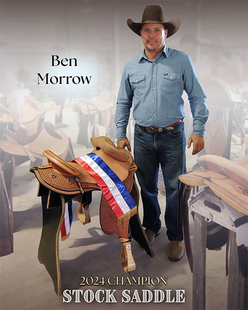 Ben Morrow standing with his winning stock saddle